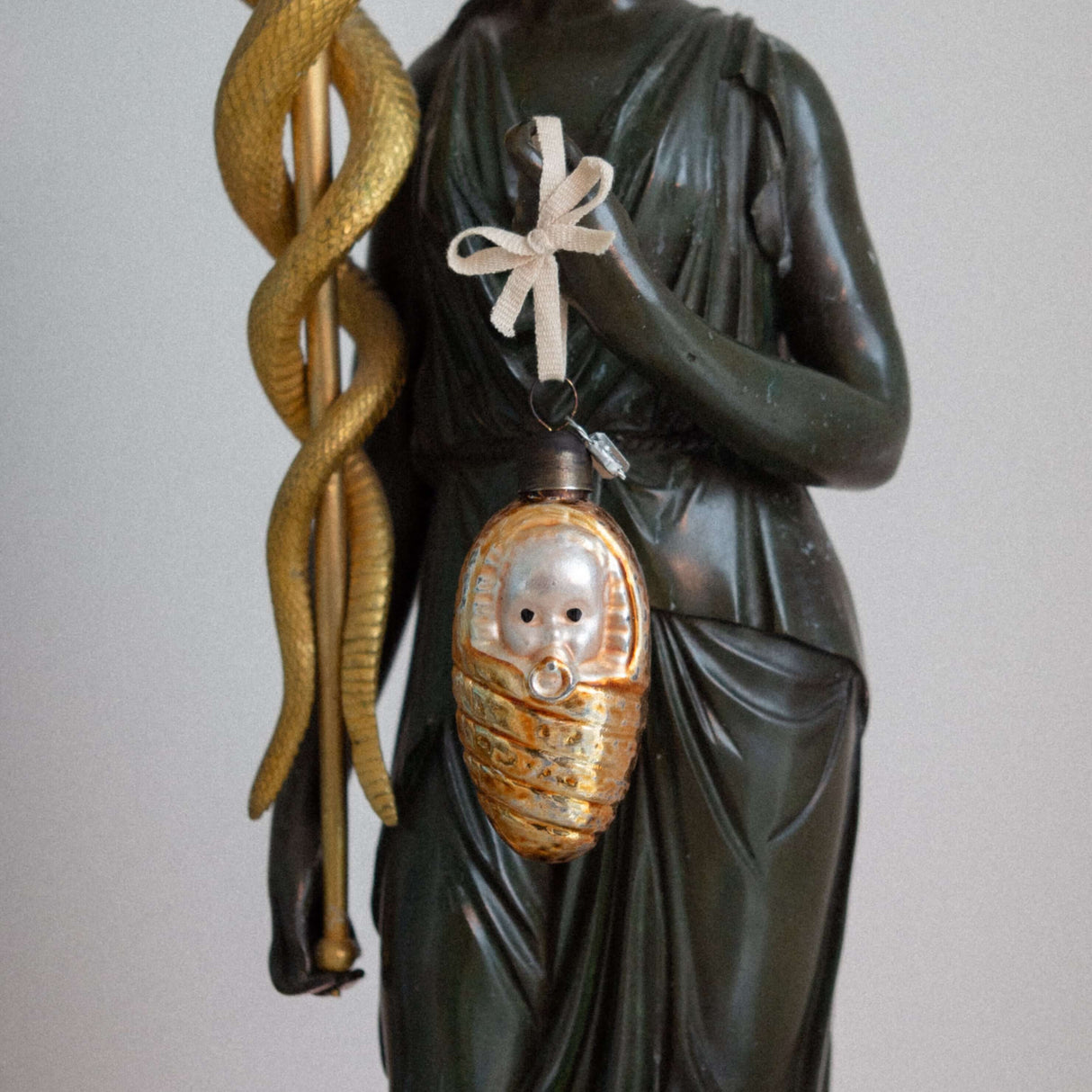 Swaddled baby glass decoration