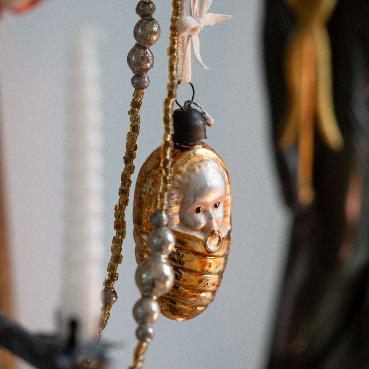 Swaddled baby glass decoration