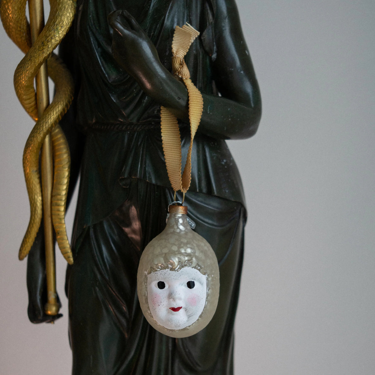 Glass baby angel head ornament