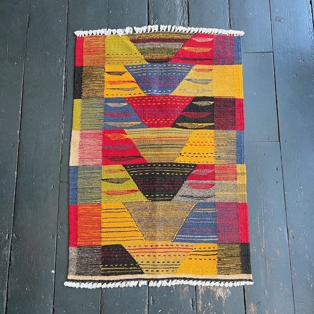 Embroidered flat weave