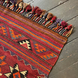 Fringed vintage rug