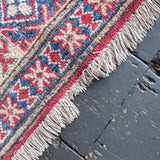 Hand knotted Kazak rug