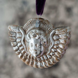 Silvered angel head & wings ornament